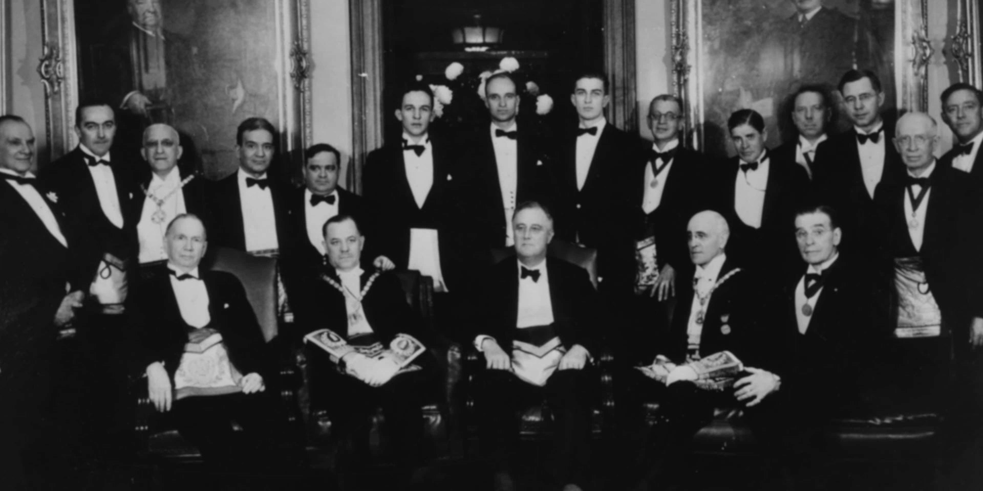 Historic photograph of Freemasons in formal regalia
